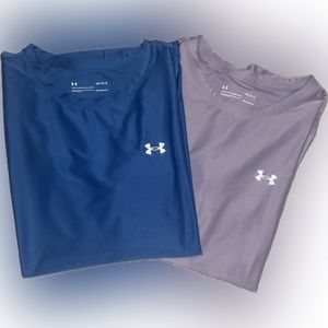 2 Women’s Under Armour shirts. Sold as a pair.